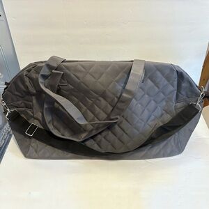 NWOT Gray Quilted Duffel Bag